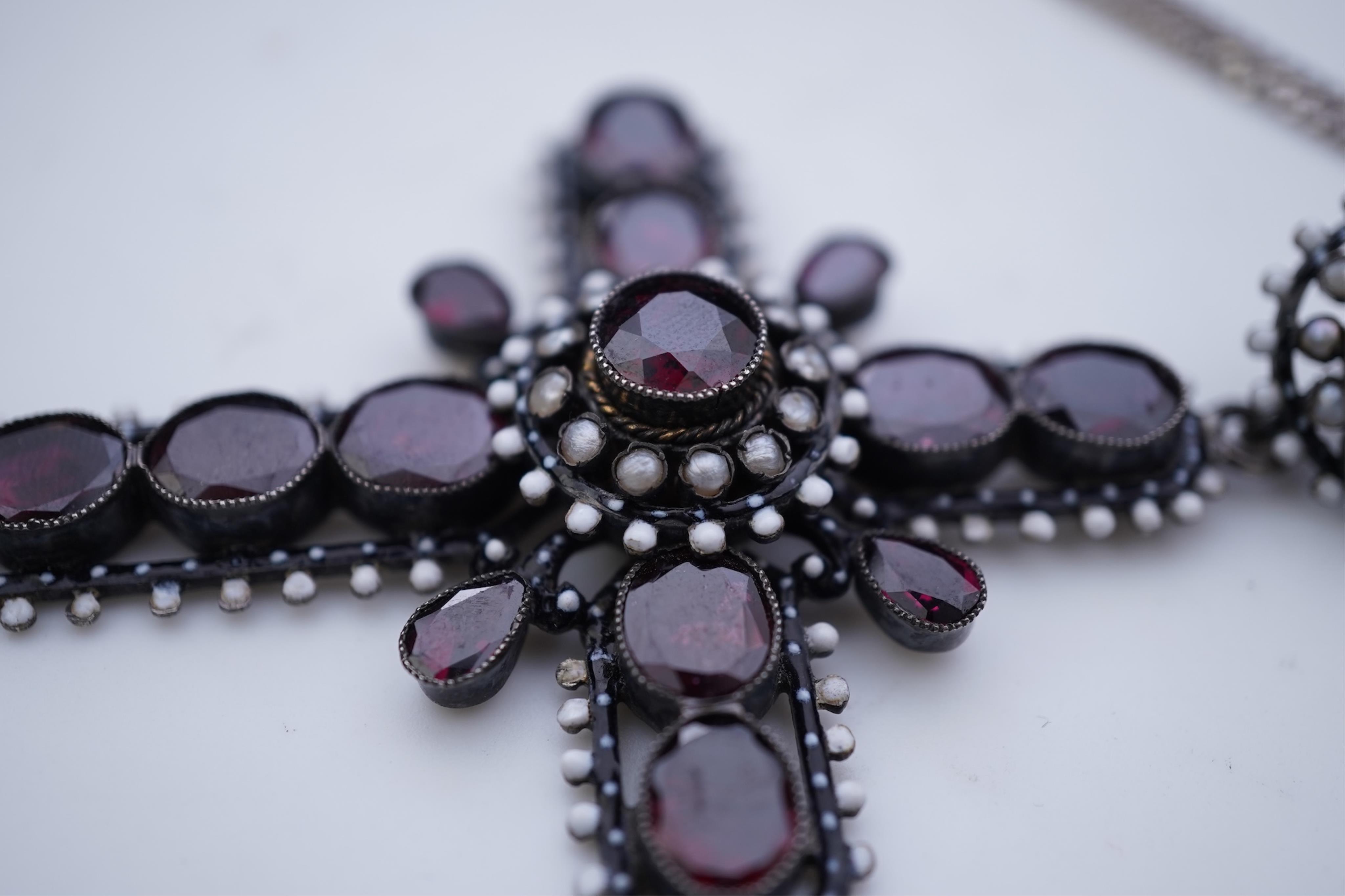 A Renaissance Revival enamel and garnet pendant, late 19th century